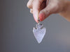 video featuring rose quartz arrowhead pendants