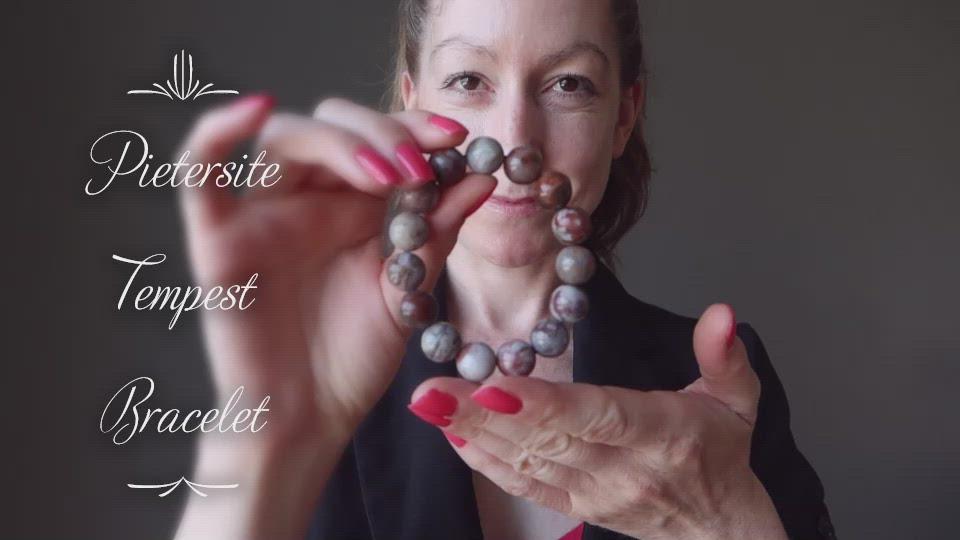 video of female model showcasing pietersite stretch bracelet