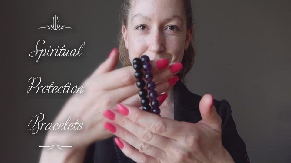 video of female modeling black tourmaline and amethyst bracelet set