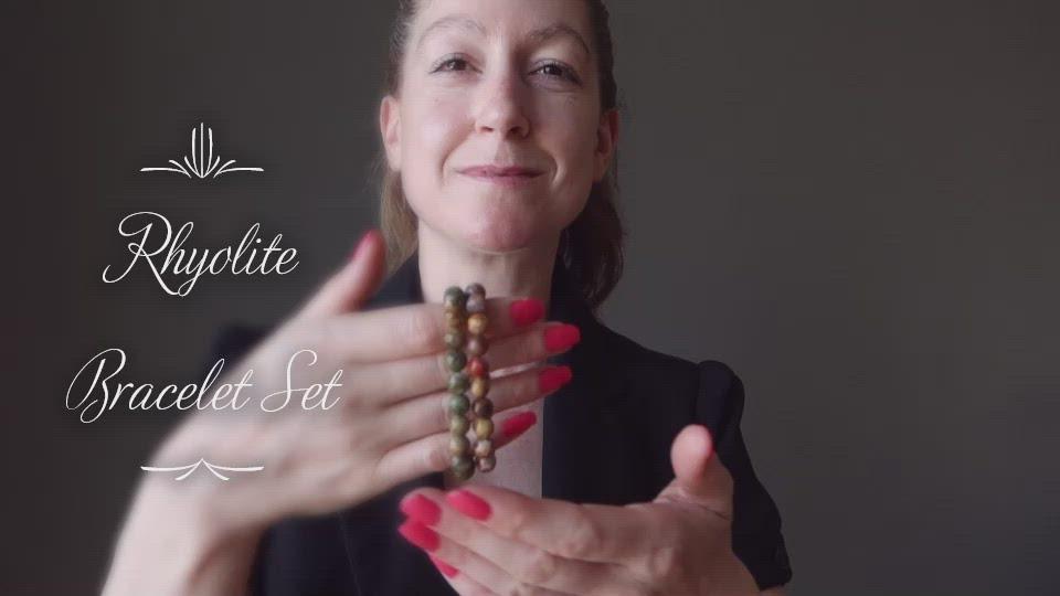 video of female modeling rhyolite bracelets at satin crystals