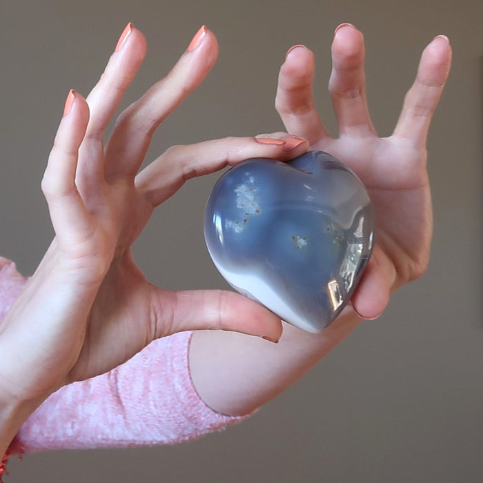 female model holding Blue Lace Agate Heart