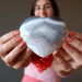 female model holding Blue Lace Agate Heart 