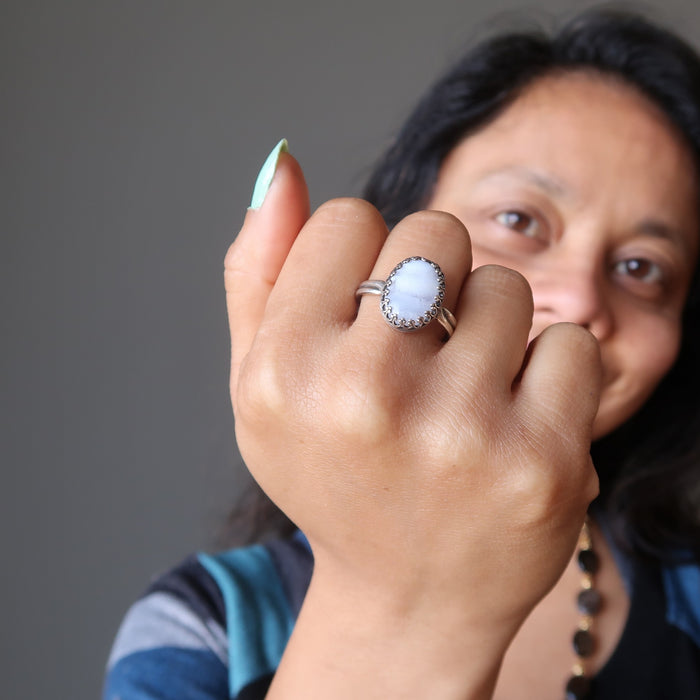 sheila of satin crystals wearing a blue lace agate ring