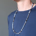 botswana agate necklace on male model