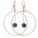 moss agate flower beads hanging in copper hoop earrings