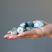 palm holding Tree Agate Tumbled Stones