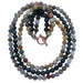 triple strand necklace featuring botswana, moss and crazy lace agate beads