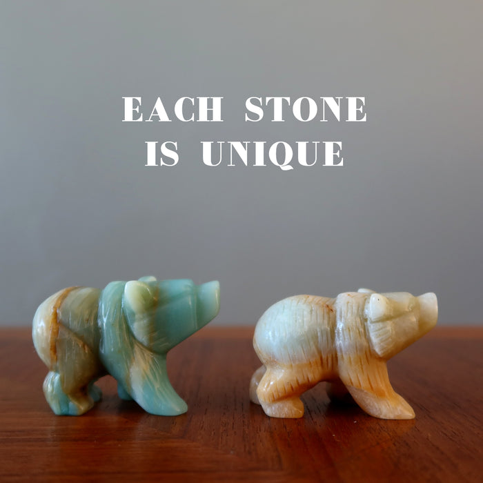 standing on the table a  light brown and a  green Amazonite Polar Bear Figurines