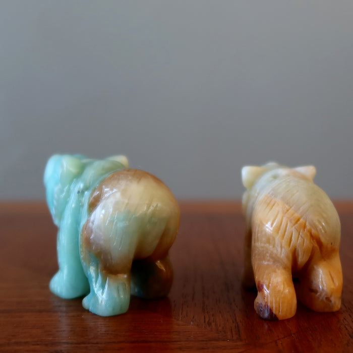 back side of a  light brown and a green Amazonite Polar Bear Figurines