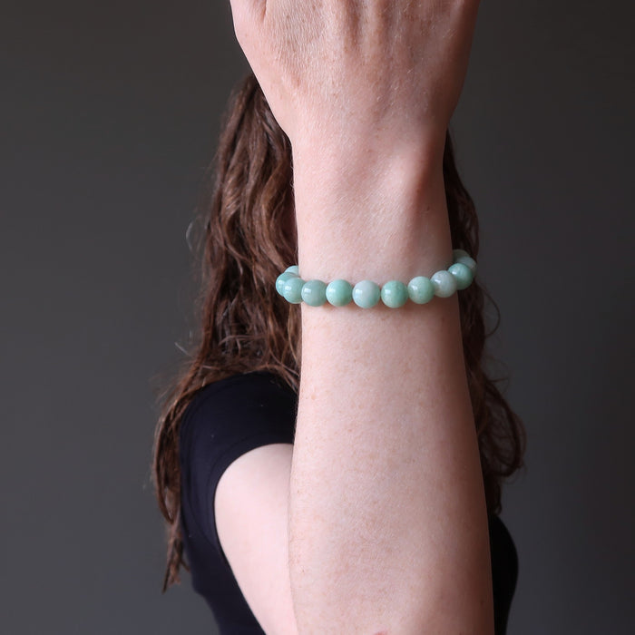 female model showing off an amazonite stretch bracelet