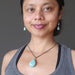sheila of satin crystals wearing amazonite earrings and necklace