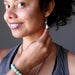sheila of satin crystals wearing amazonite earrings