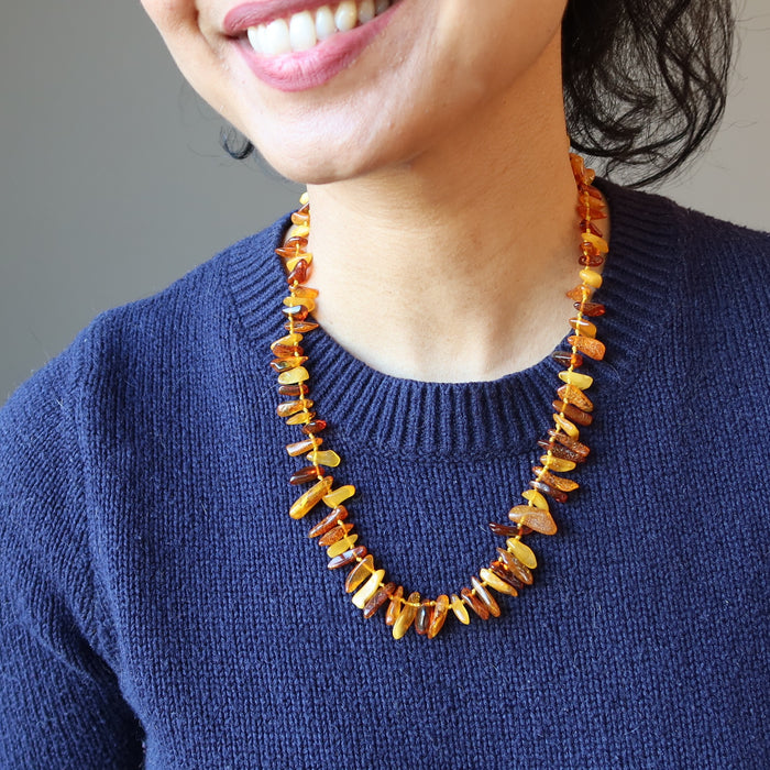 Sheila of Satin Crystals wearing Yellow Orange Red Baltic Amber 10-18mm beads Knotted Necklace 