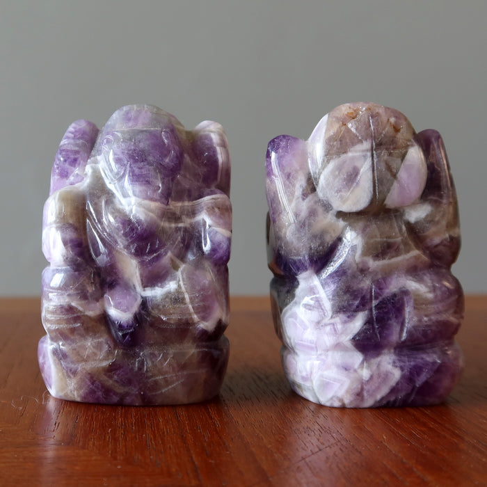 two Amethyst purple Ganesh Elephant Gods showing front and back  