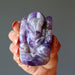 model hand holding Amethyst purple Ganesh Elephant God 