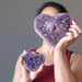 sheila of satin crystals each hand holding small and large Dark Purple Geode Amethyst Heart Cluster Cluster 