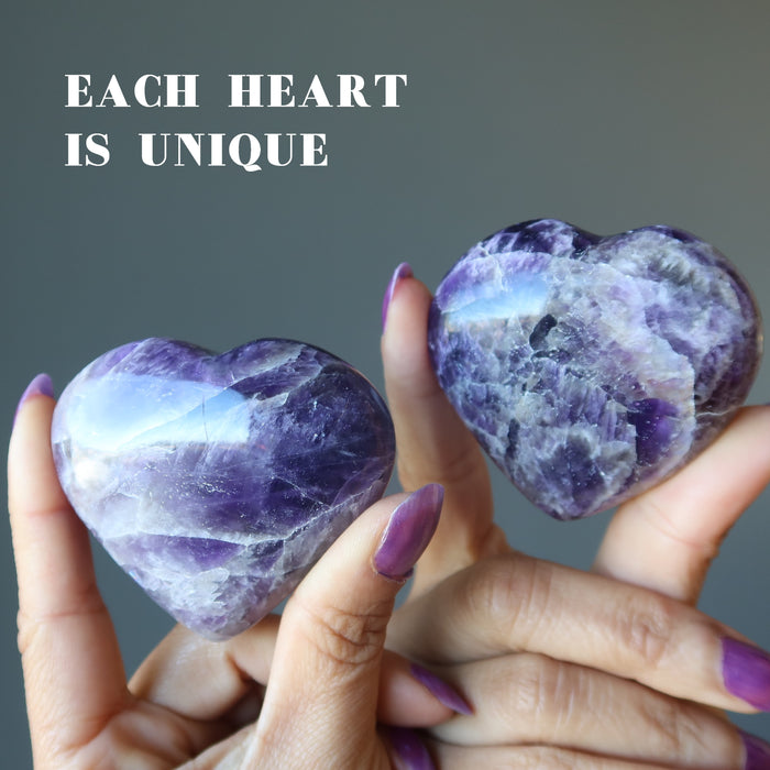 hands holding amethyst hearts to show each is unique