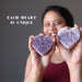 sheila of satin crystals holding two 3.0-3.75 Inches violet amethyst heart crystal clusters