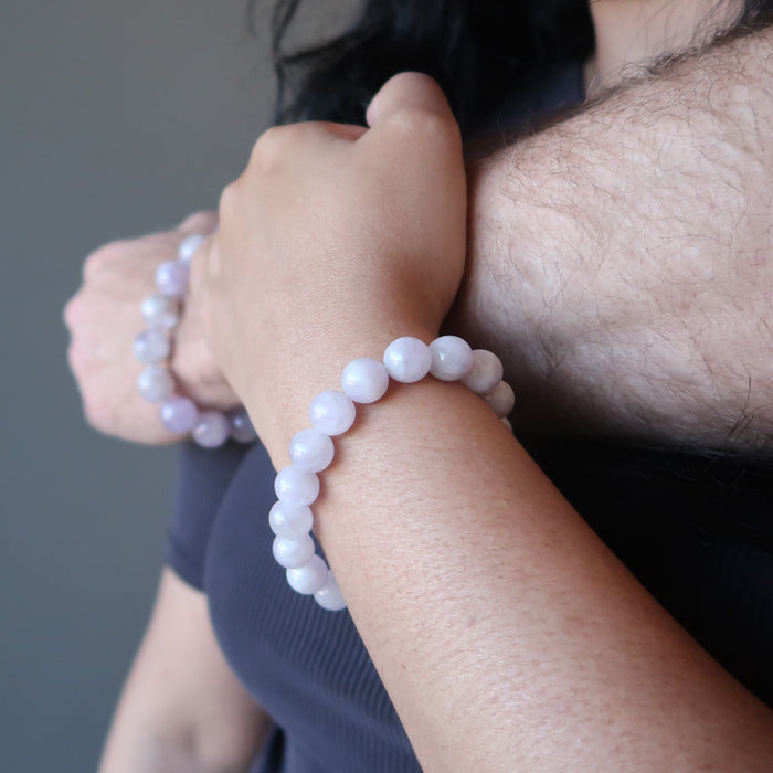 man and woman modeling lavender purple amethyst bracelets in 9mm and 13mm