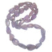 in a folded coil large faceted Amethyst Necklace 