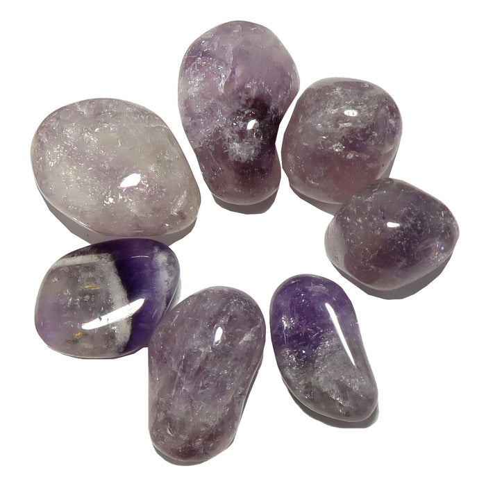 a set of 7 amethyst tumbled stones