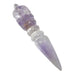 purple amethyst crystal carved into a tibetan phurba dagger