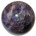 Uruguay amethyst sphere with deep purple color and striking red iron minerals