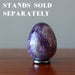 dark purple amethyst gemstone egg on the ring stand sold separately
