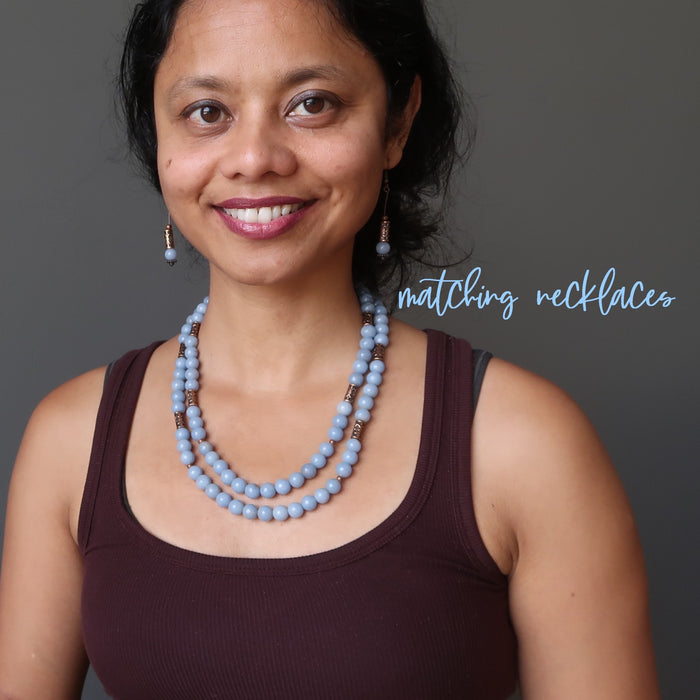 sheila of satin crystals wearing angelite earrings and matching necklaces
