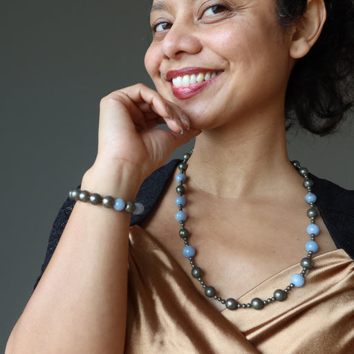sheila of satin crystals wearing pyrite and angelite beaded necklace and bracelet