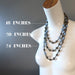 three pyrite and angelite beaded necklaces on mannequin