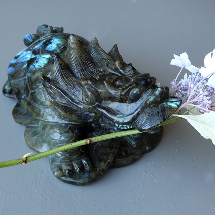big labradorite dragon turtle carving with flowers in his mouth
