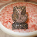 Rhodonite Owl Figurine Pink Messenger of Love Gemstone Carving standing on a round pink tile
