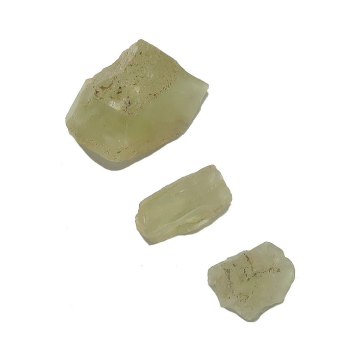 three raw green apatite stones