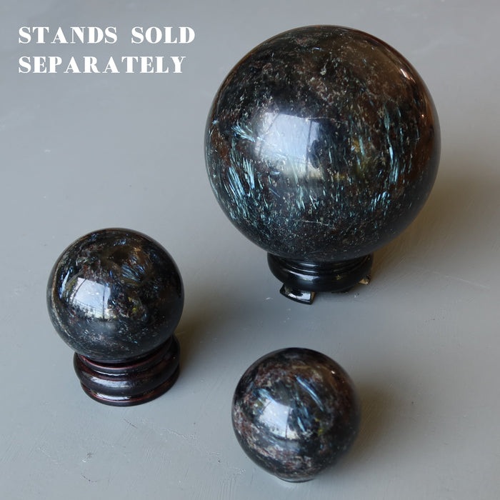 3 arfvedsonite spheres on stands sold separately