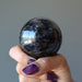 holding arfvedsonite sphere in fist