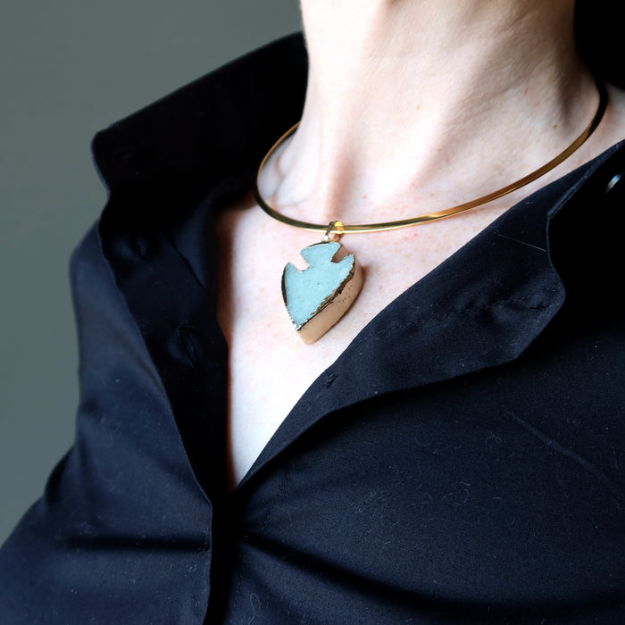 woman's neck modeling green aventurine arrowhead necklace