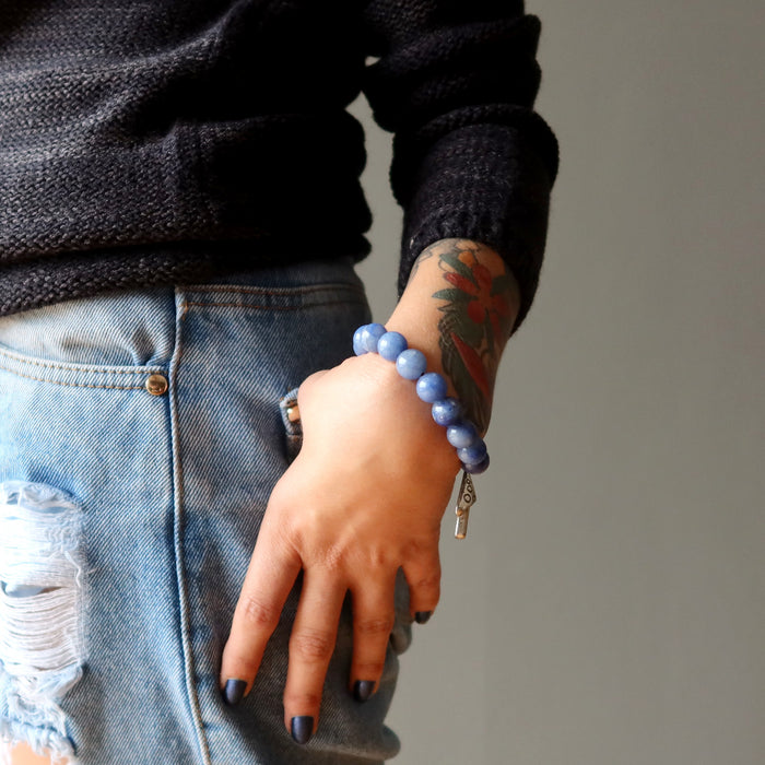 woman with hand in pocket wearing blue aventurine mushroom bracelet