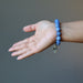 palm up wearing blue aventurine mushroom stretch bracelet
