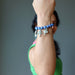 female model with hand up wearing blue aventurine mushroom stretch bracelet