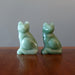 two aventurine cats on table