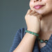 woman modeling green aventurine beaded stretch bracelet