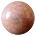 pink aventurine sphere with black and yellow inclusions