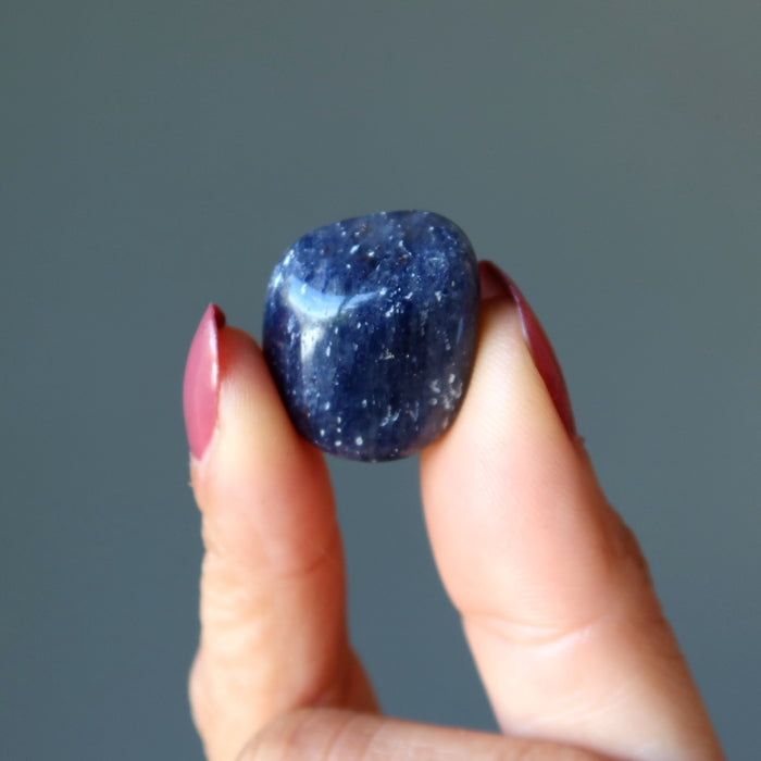 holding one Blue Aventurine Tumbled Stone