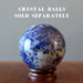 sodalite ball on rosewood display stand