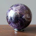amethyst sphere on hematine ring stand
