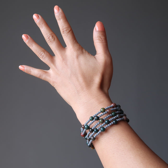 female hand modeling bloodstone wire wrap bracelet
