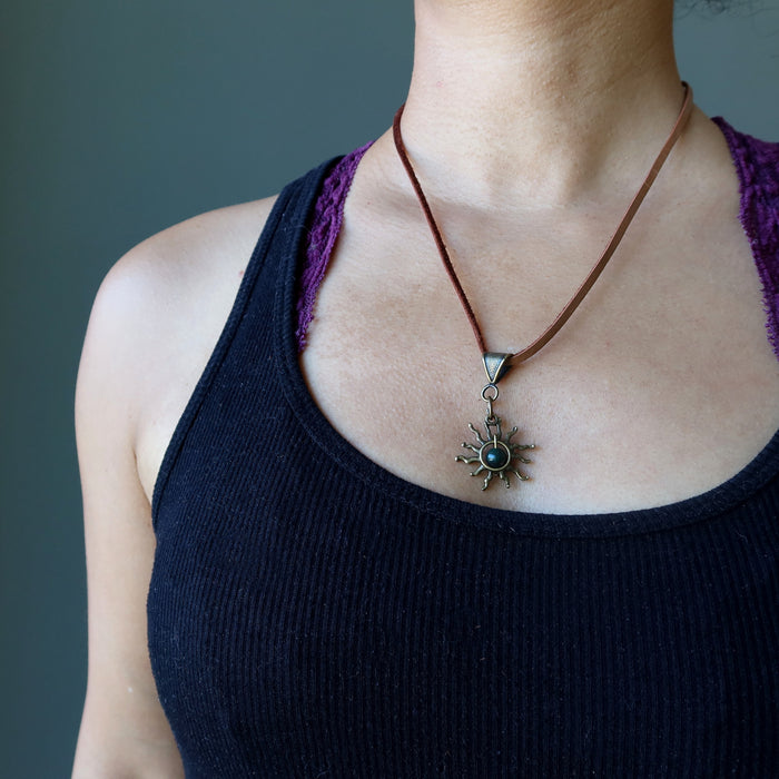 sheila of satin crystals wearing a bloodstone sun necklace on leather cord