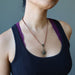 sheila of satin crystals wearing a bloodstone sun necklace on leather cord