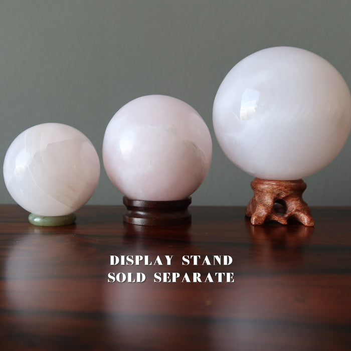 pink calcite spheres on stands